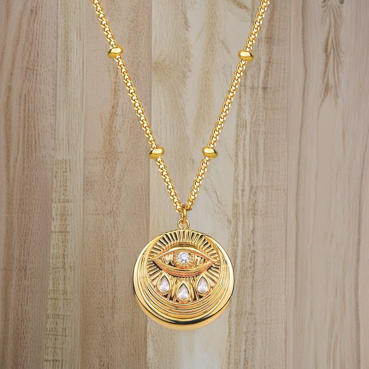 Gold evil eye pendant